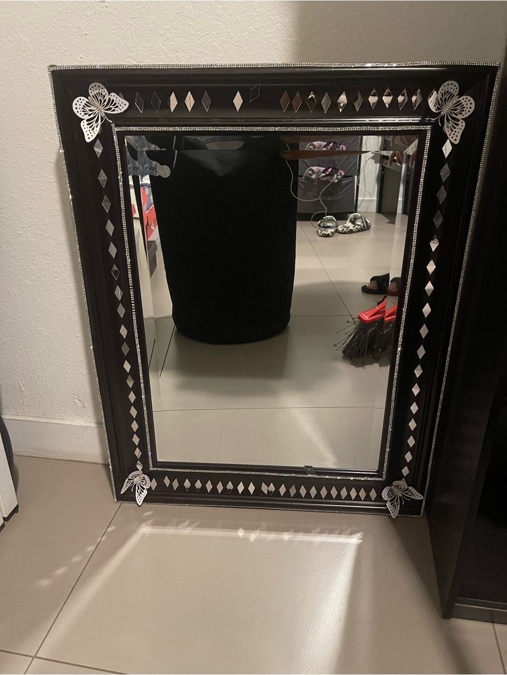 Decorative Black Wall Mirror with Silver Accents